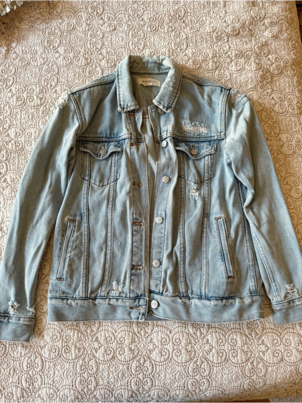 Vintage light wash distressed denim jacket